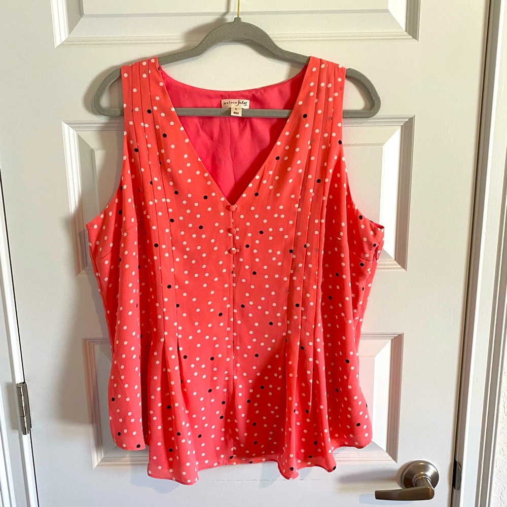 Peplum polka dotted sleeveless top
